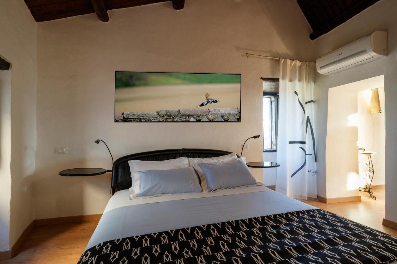 Relais Borgo Lizori Country House กัมเปลโล ซุล กลีตุนโน ภายนอก รูปภาพ