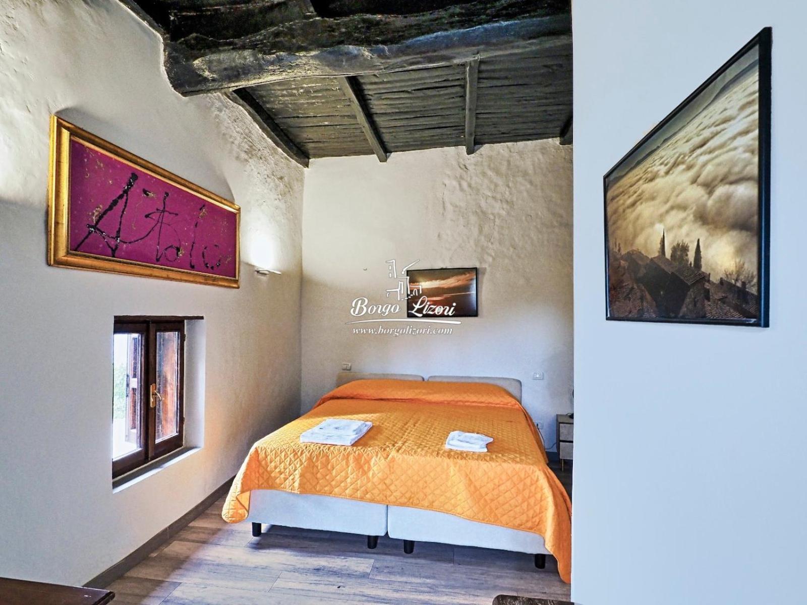 Relais Borgo Lizori Country House กัมเปลโล ซุล กลีตุนโน ภายนอก รูปภาพ