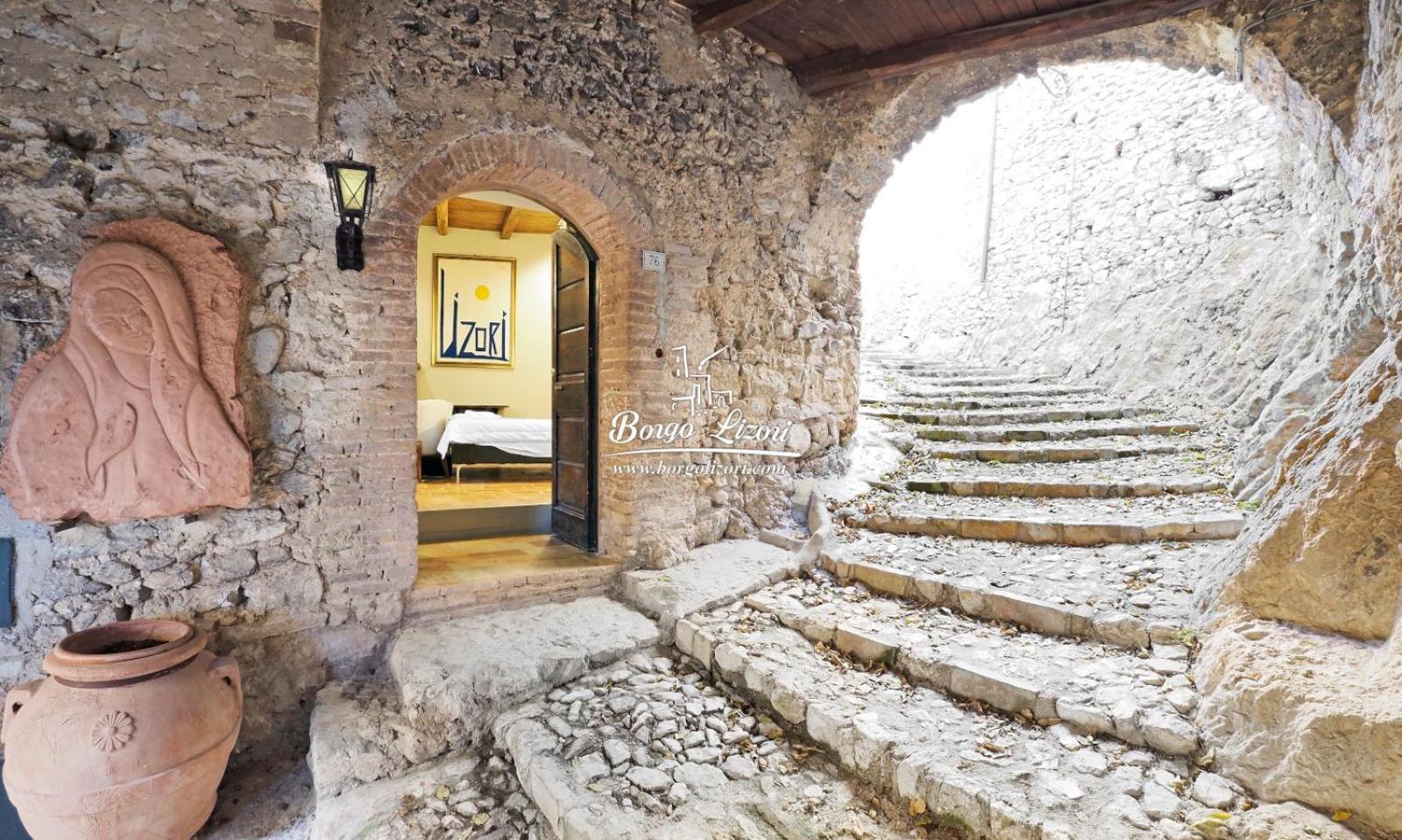 Relais Borgo Lizori Country House กัมเปลโล ซุล กลีตุนโน ภายนอก รูปภาพ
