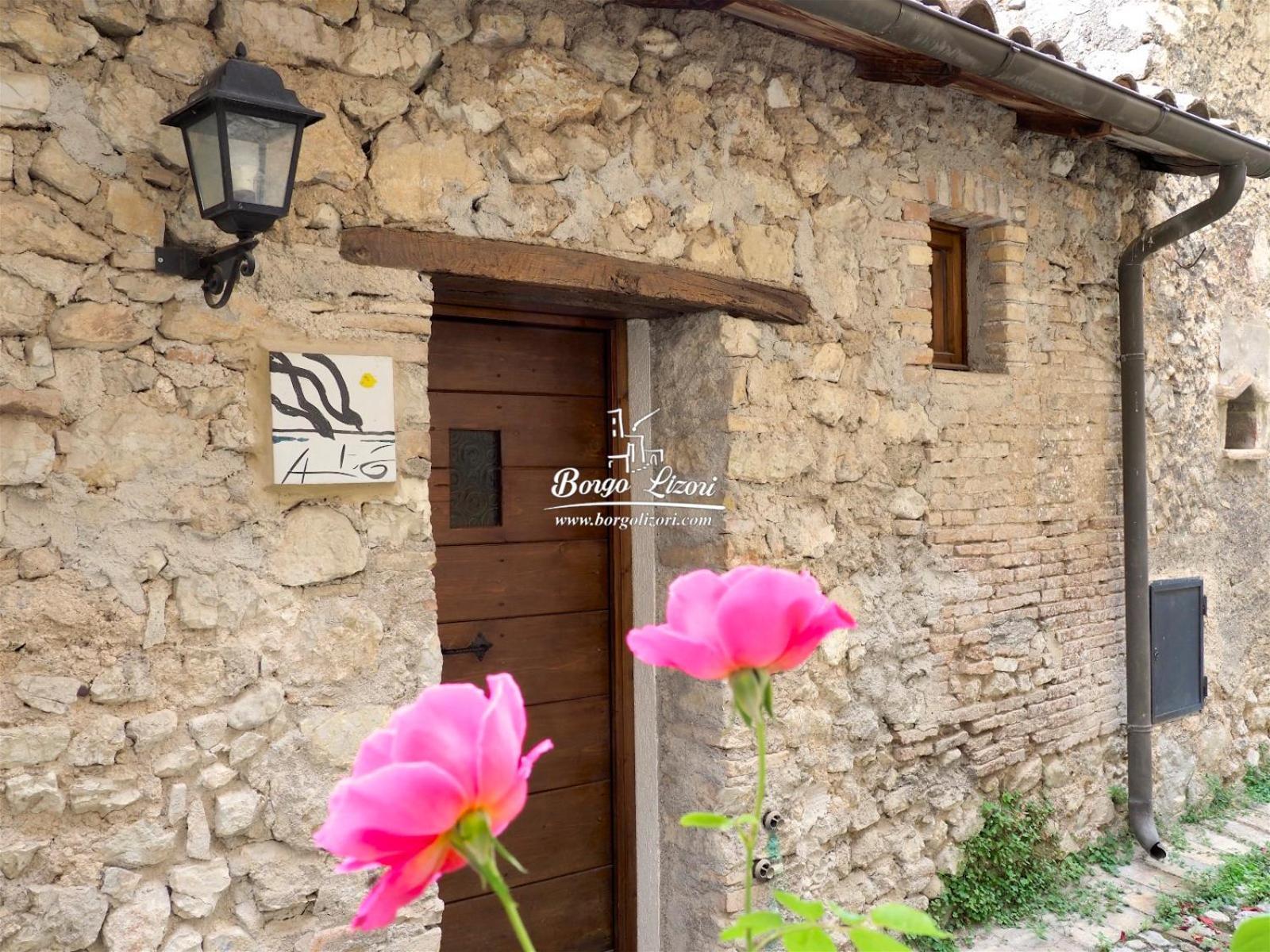 Relais Borgo Lizori Country House กัมเปลโล ซุล กลีตุนโน ภายนอก รูปภาพ